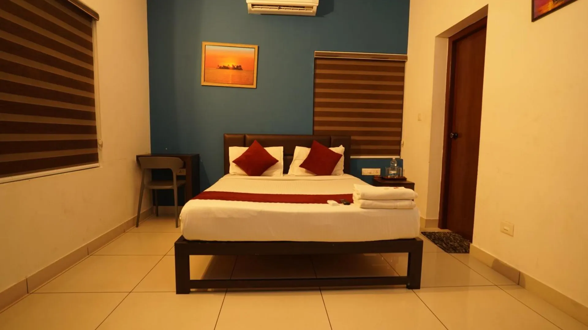 Atmos Inn Kozhikode Hotel