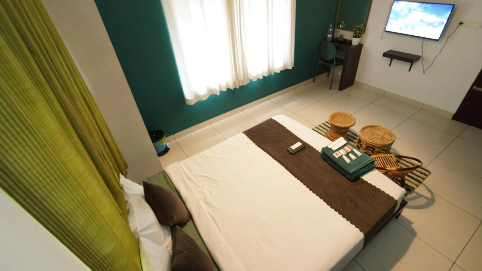 Atmos Inn Kozhikode Hotel