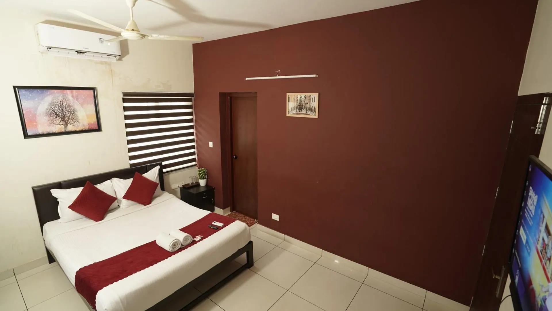 Atmos Inn Kozhikode